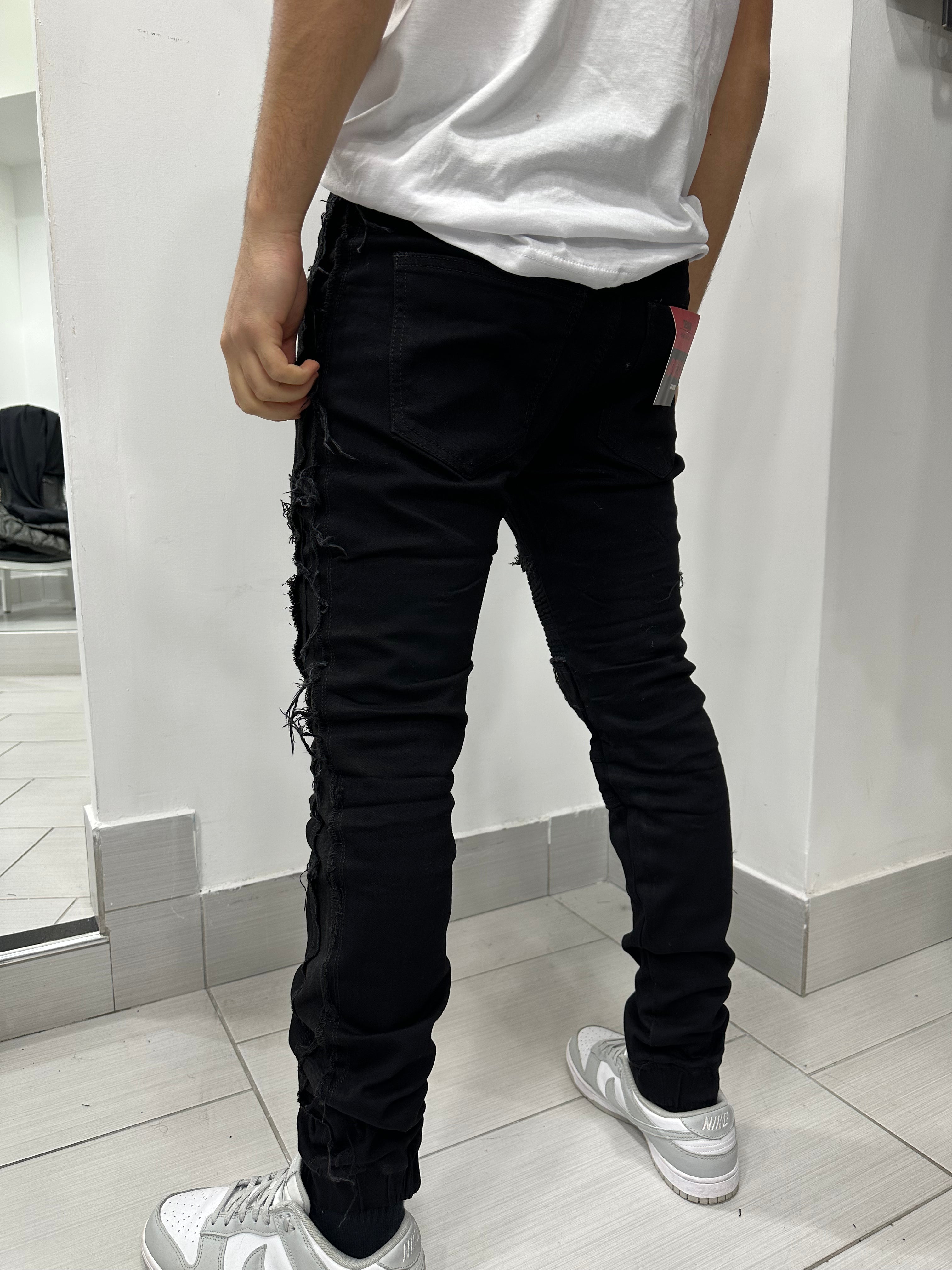 Jeans skinny strappato